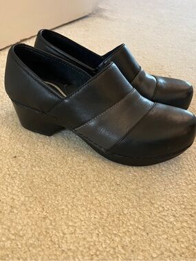 Dansko Black Leather Slip-On Clogs